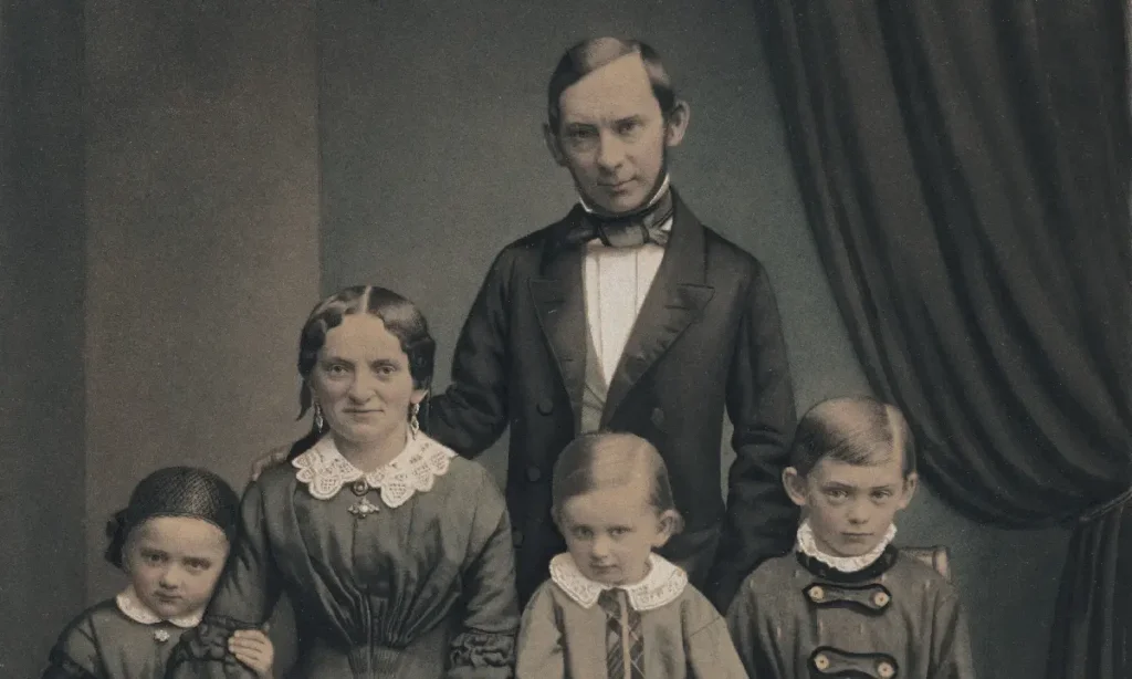 Portrait of a Family, 1850s, salted paper print with applied color. By unknown 19th century artist. Image portrays a family of a man, woman and three children posing for a portrait.